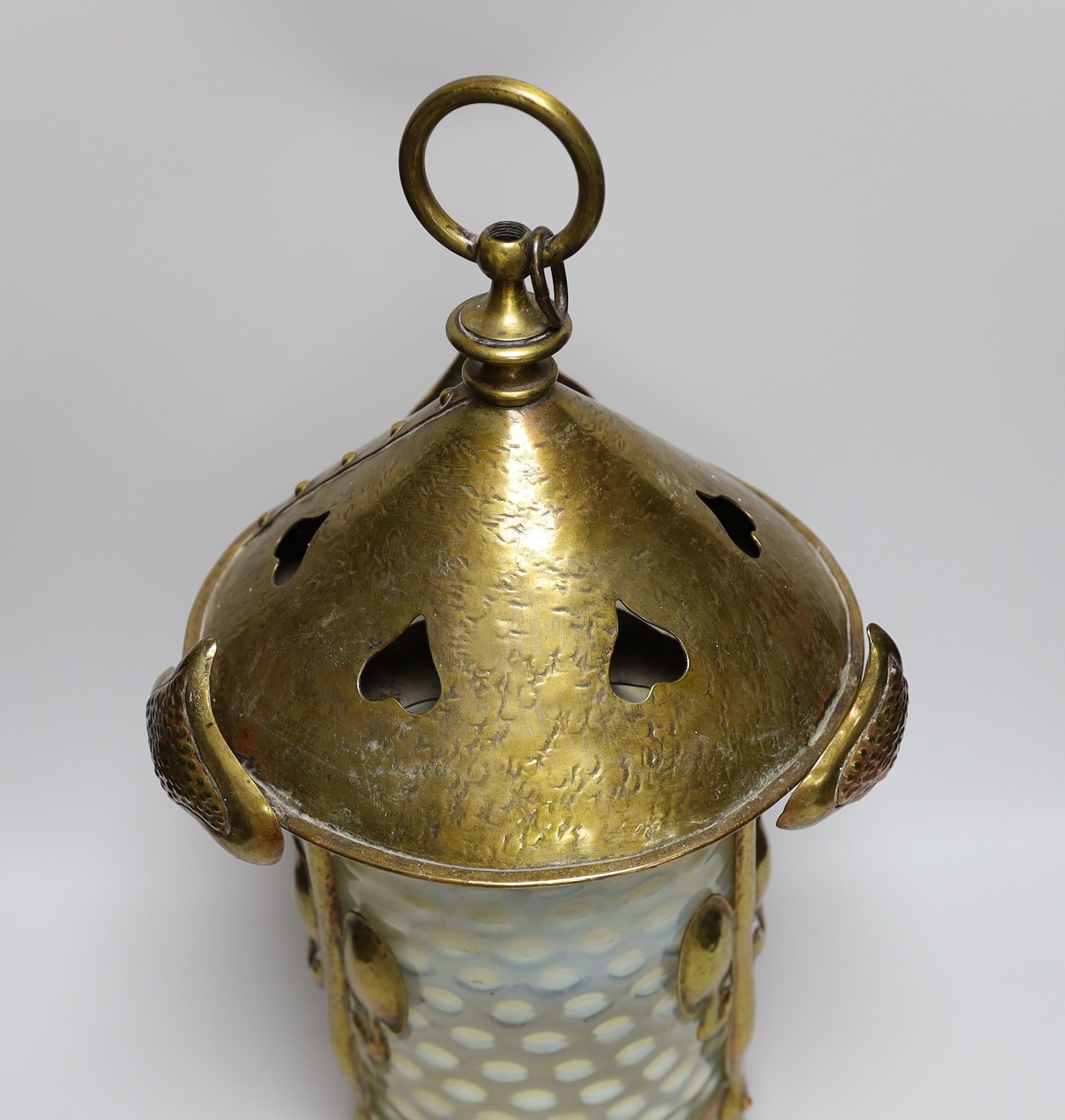 An Art Nouveau brass and vaseline glass hall lantern, 47cm